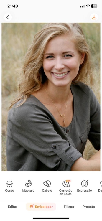 change hair color - blond woman in grey smiling ab first