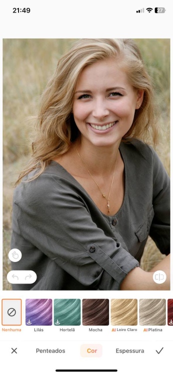 change hair color - blond woman in grey smiling ab second