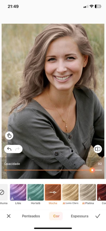 change hair color - blond woman in grey smiling ab third