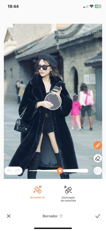 remove people from photos - asian girl in black in the street AB screenshot before