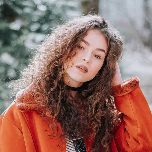 ghibli filter - curly girl in red before