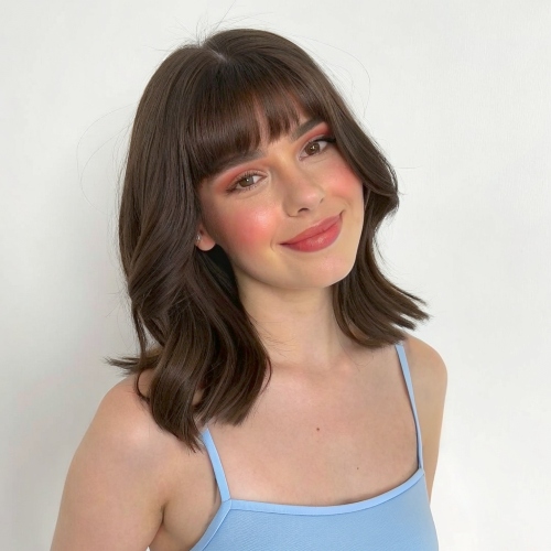 bangs filter - brunette girl in blue top after